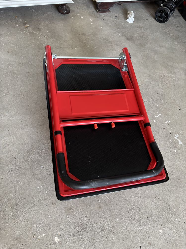 Carrinho dobravel nunca usado