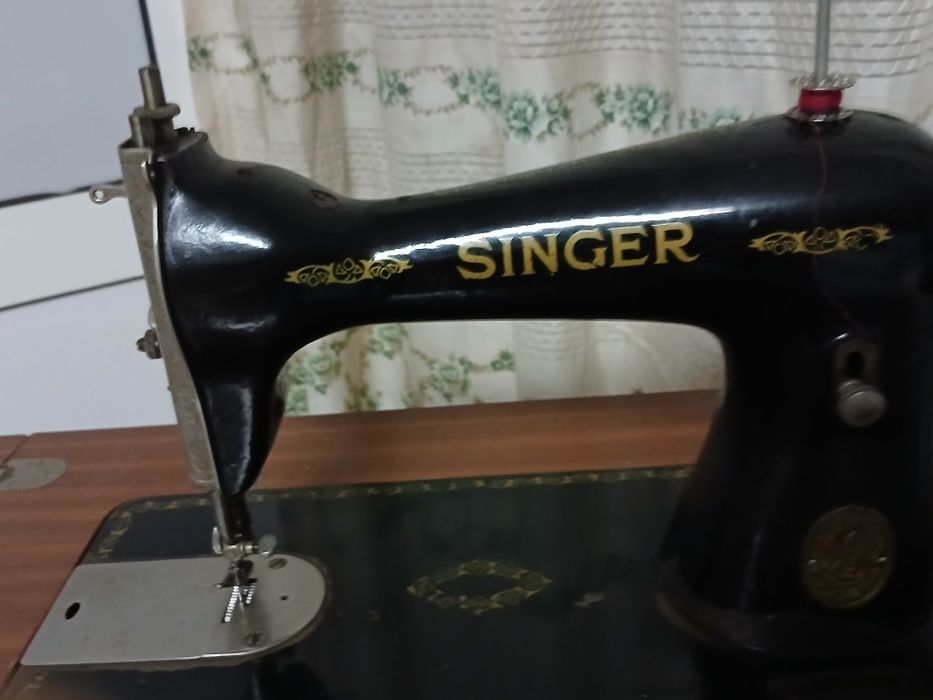 Máquina de costura singer