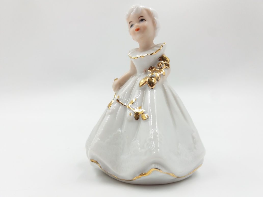 Delikatna śliczna porcelanowa figurka dziewczynki małej księżniczki