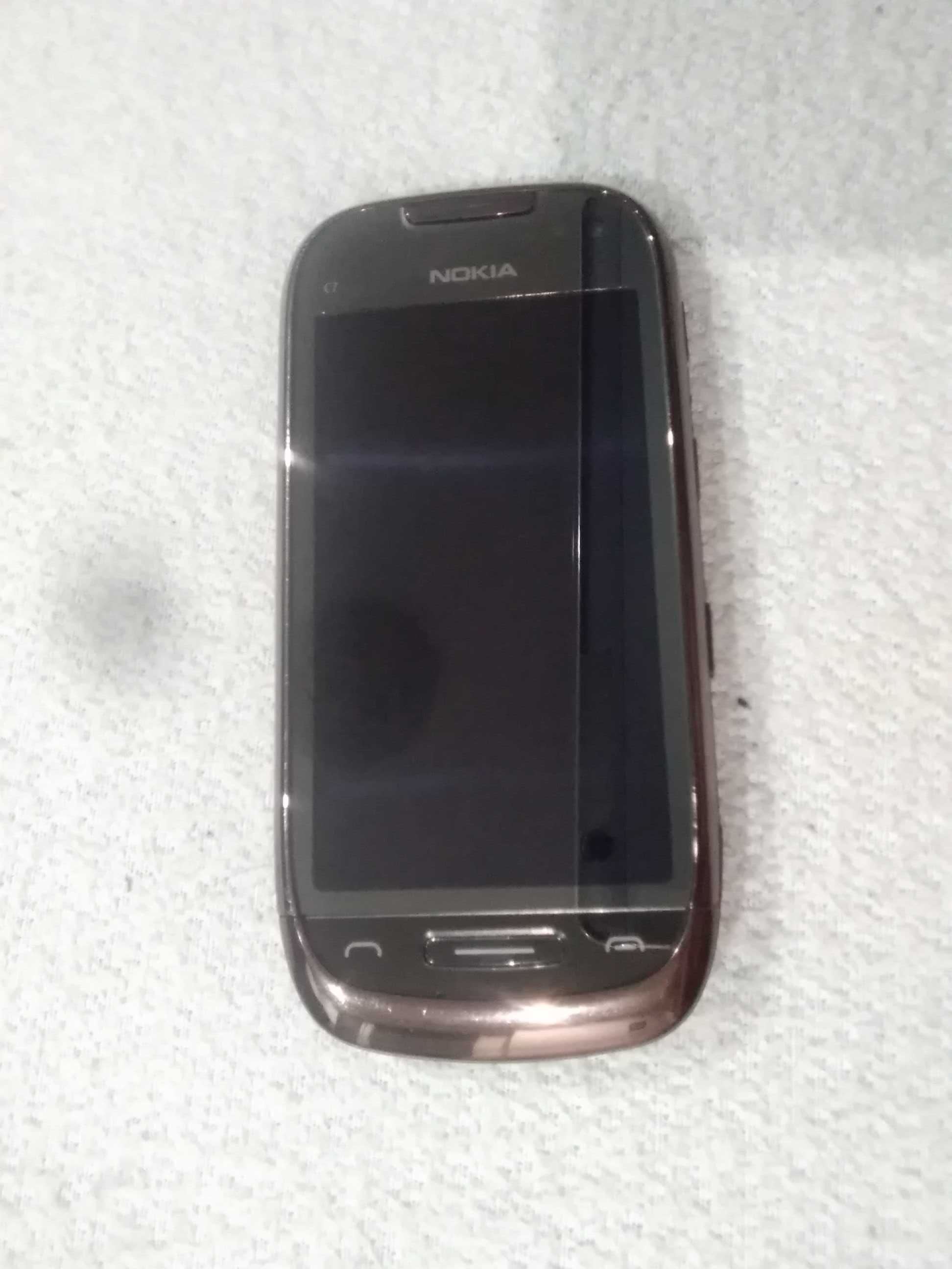 Telefon smartfon NOKIA C7-00 jak nowa stan idealny z ładowarką