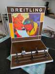 Dwustronny stojak reklamowy + display firmy Breitling.