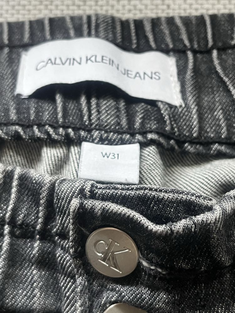 Jeansy Calvin Klein W31 czarne