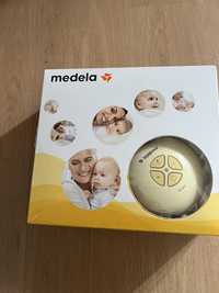 Laktator Medela Swing dwufazowy, gratis 2 butelki i smoczki Calma