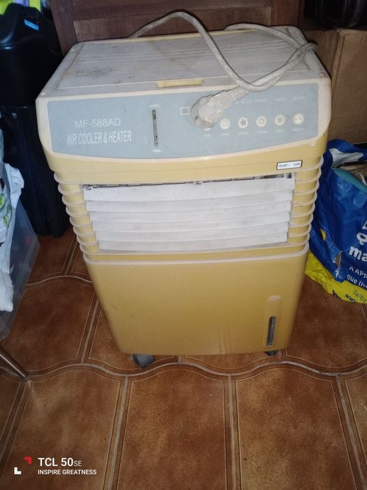 Ar condicionado portátil quente e frio, com rodas.