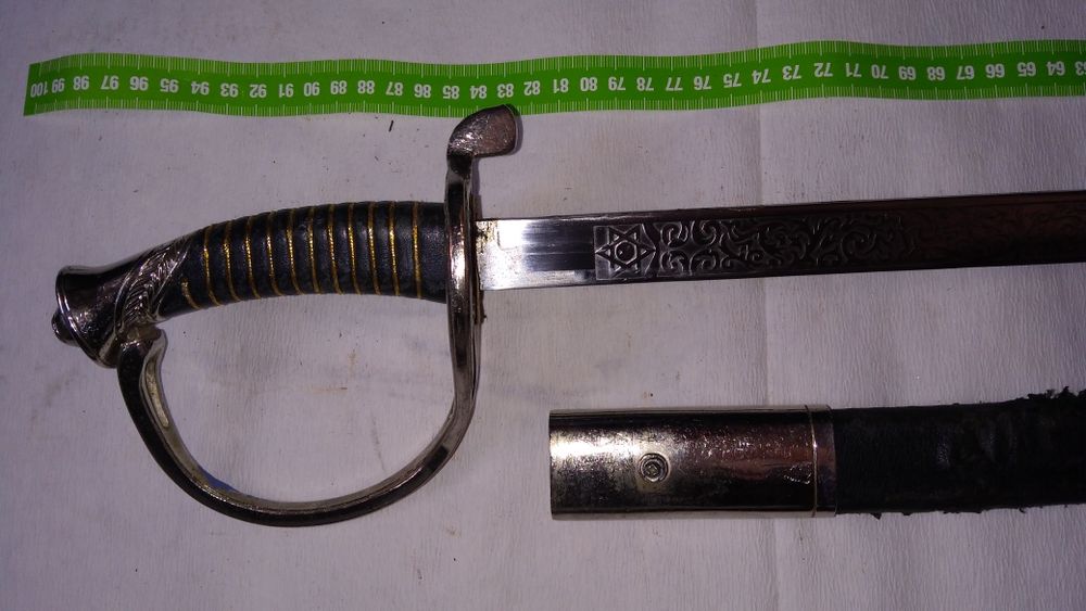 Szabla z pochwą skórzaną z trawioną głownią w cenie 1350 zł