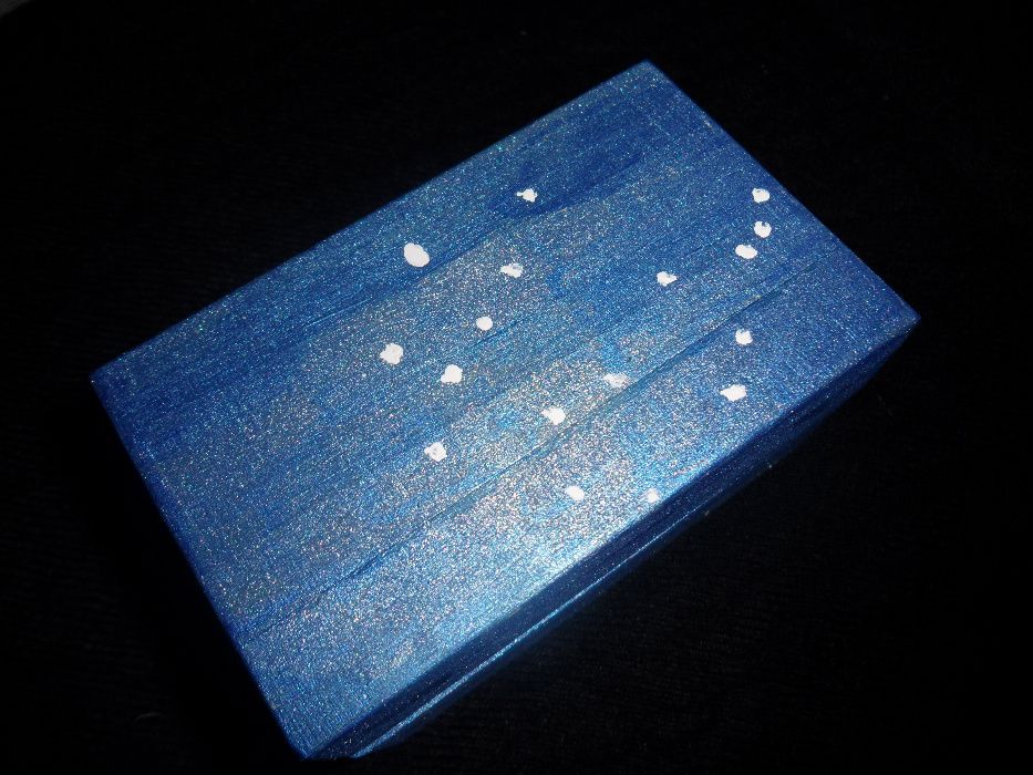 Caixa da constelação de Gemeos com Runa