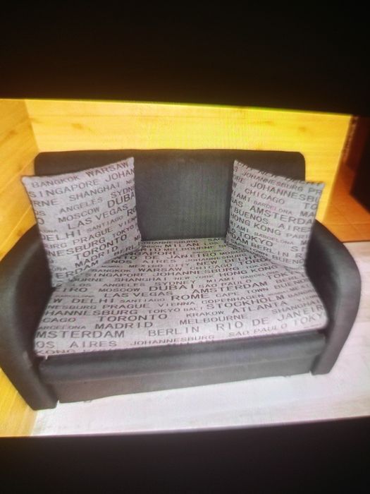 Piękna sofa dwuosobowa z pojemnikiem i możliwością spania