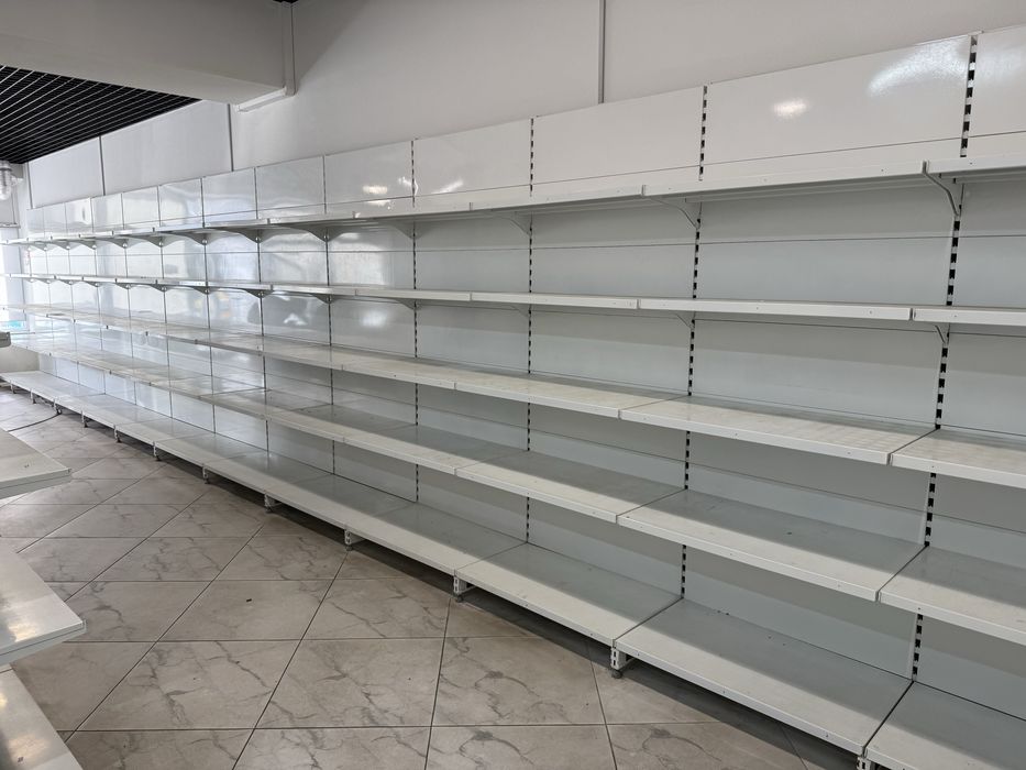 Торгові стелажі. Торгове обладнання. Вітрина холодильна. Прилавок каса