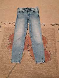 Spodnie jeansy Mohito r.34