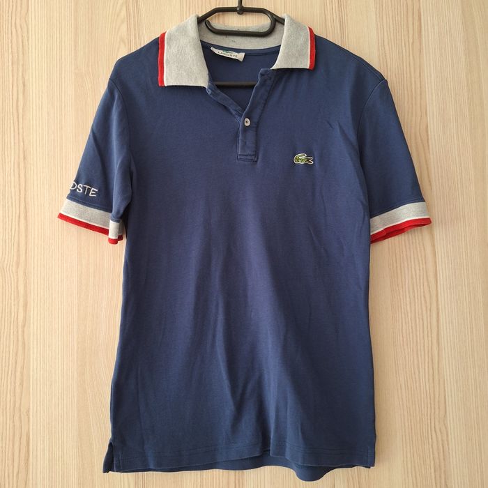 T-shirt/polo Lacosta granatowy
43 cm szerokość 
64 cm długość