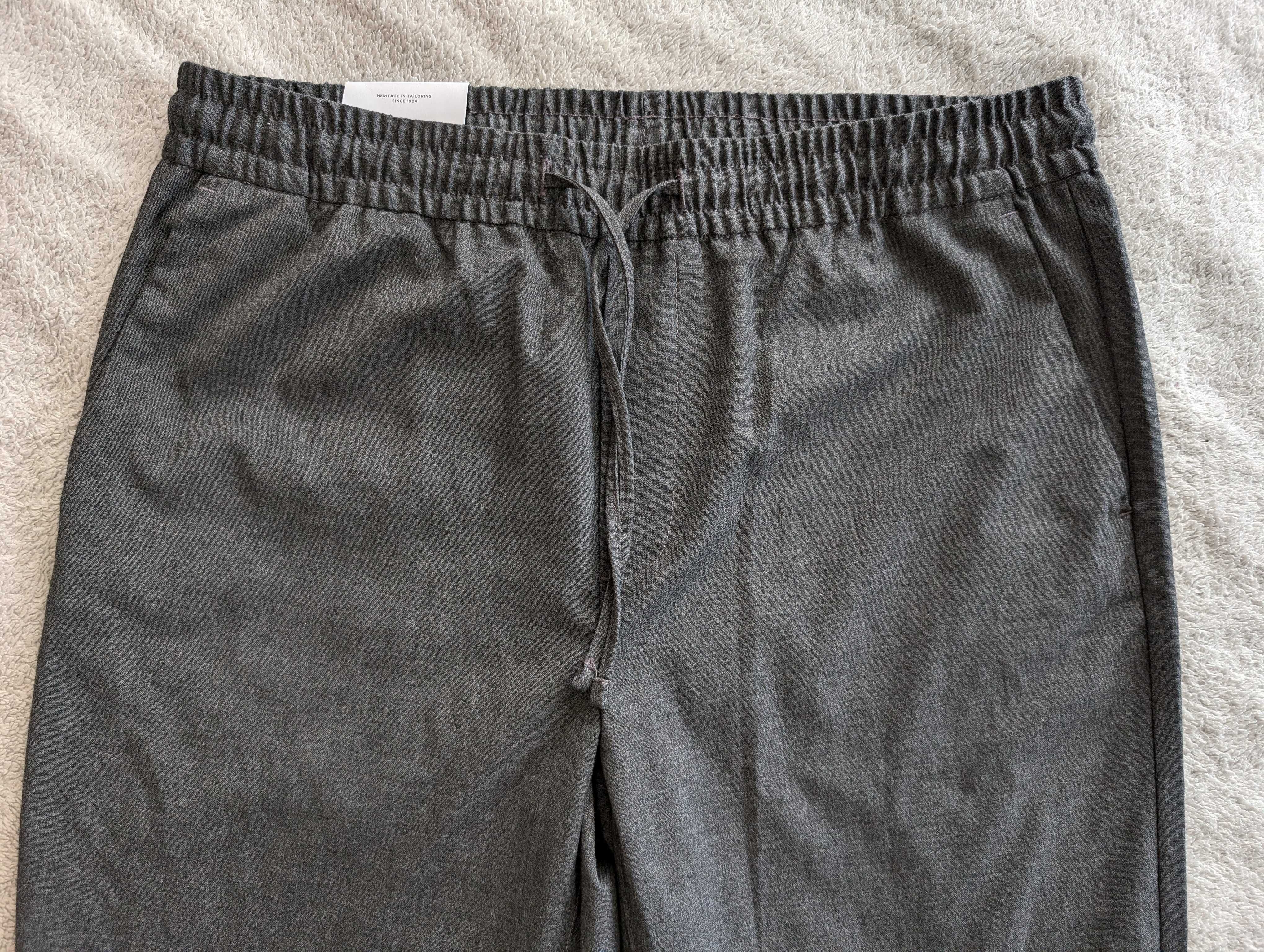 Nowe szare eleganckie spodnie joggery na gumie Burton Slim 34 R