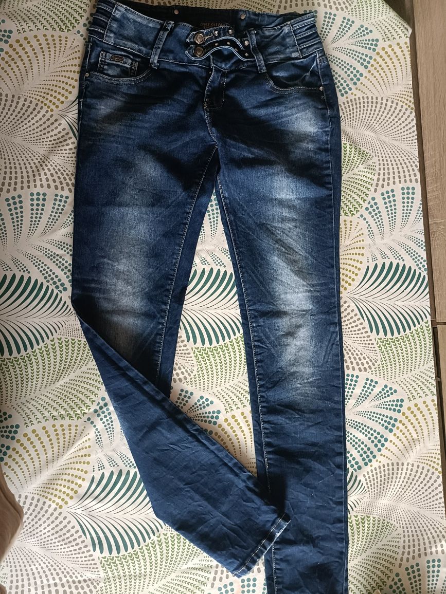 Spodnie jeans damskie rozmiar L . Niski stan