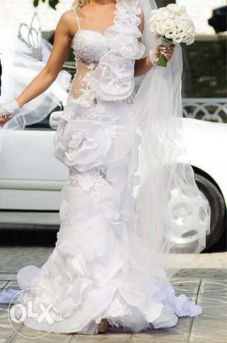 Продам весільну сукню 42-46 розміру