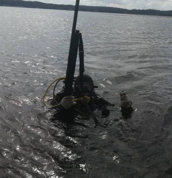 Аквалангист, водолаз , с профессиональным оборудованием