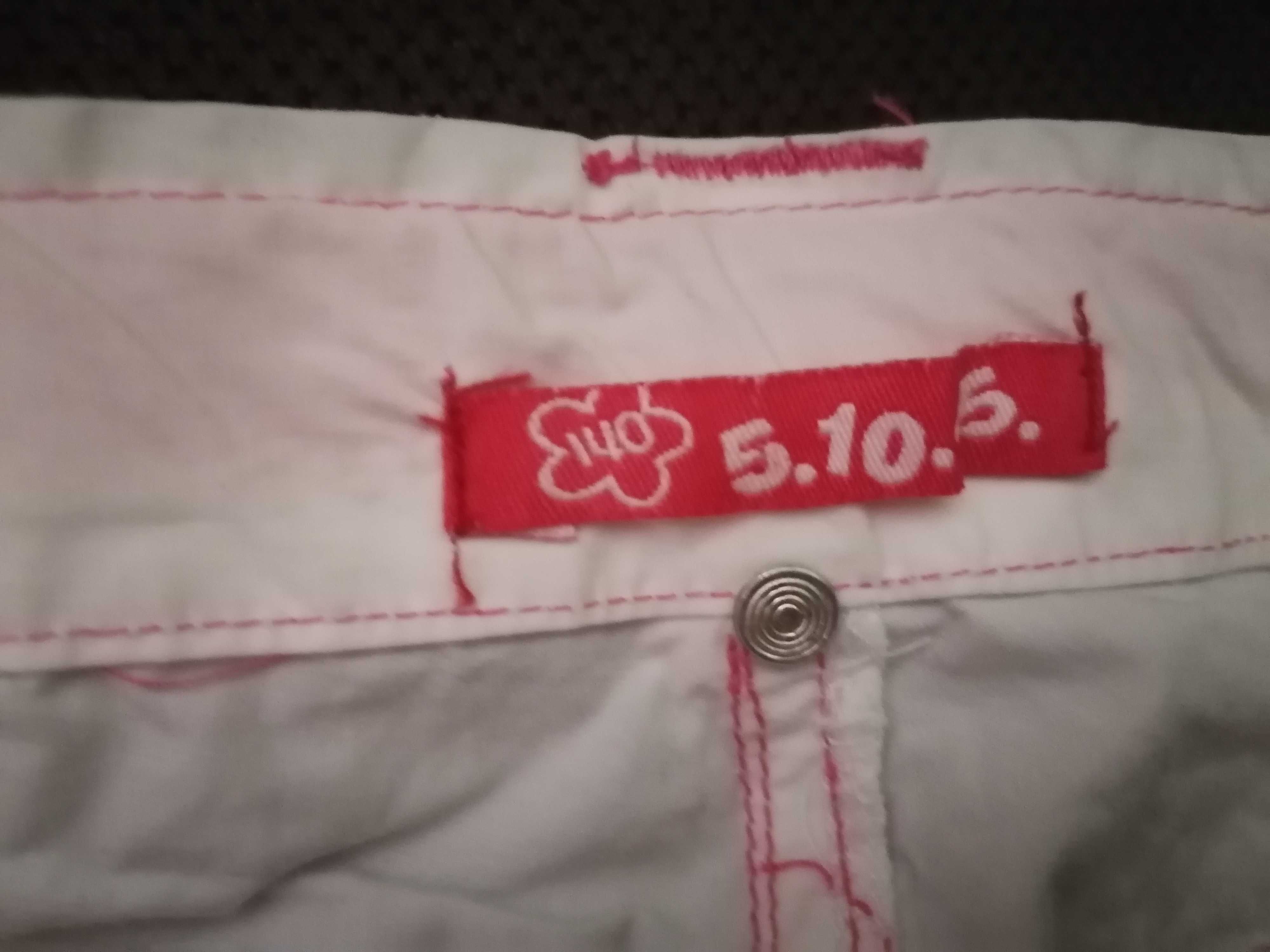 Spodnie dziewczęce 140 firmy 5 10 15 białe, kieszenie, zamki