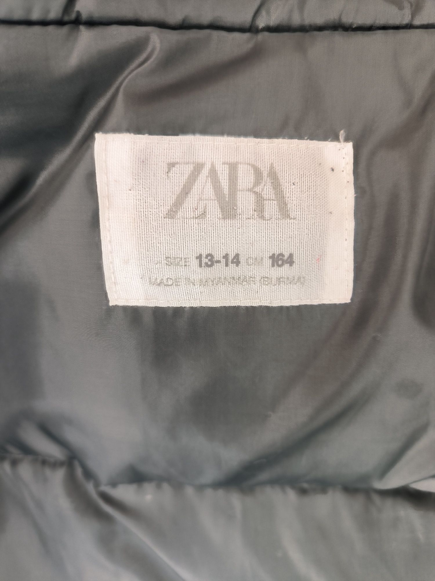 Пуховик від Zara з дефектом