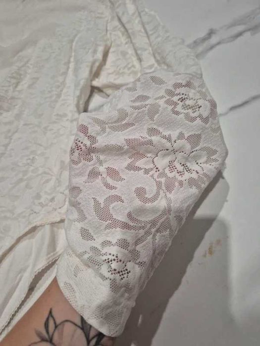 Białe koronkowe ażurowe body