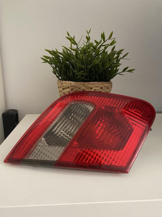 Farol esquerdo mitsubishi carisma 2002