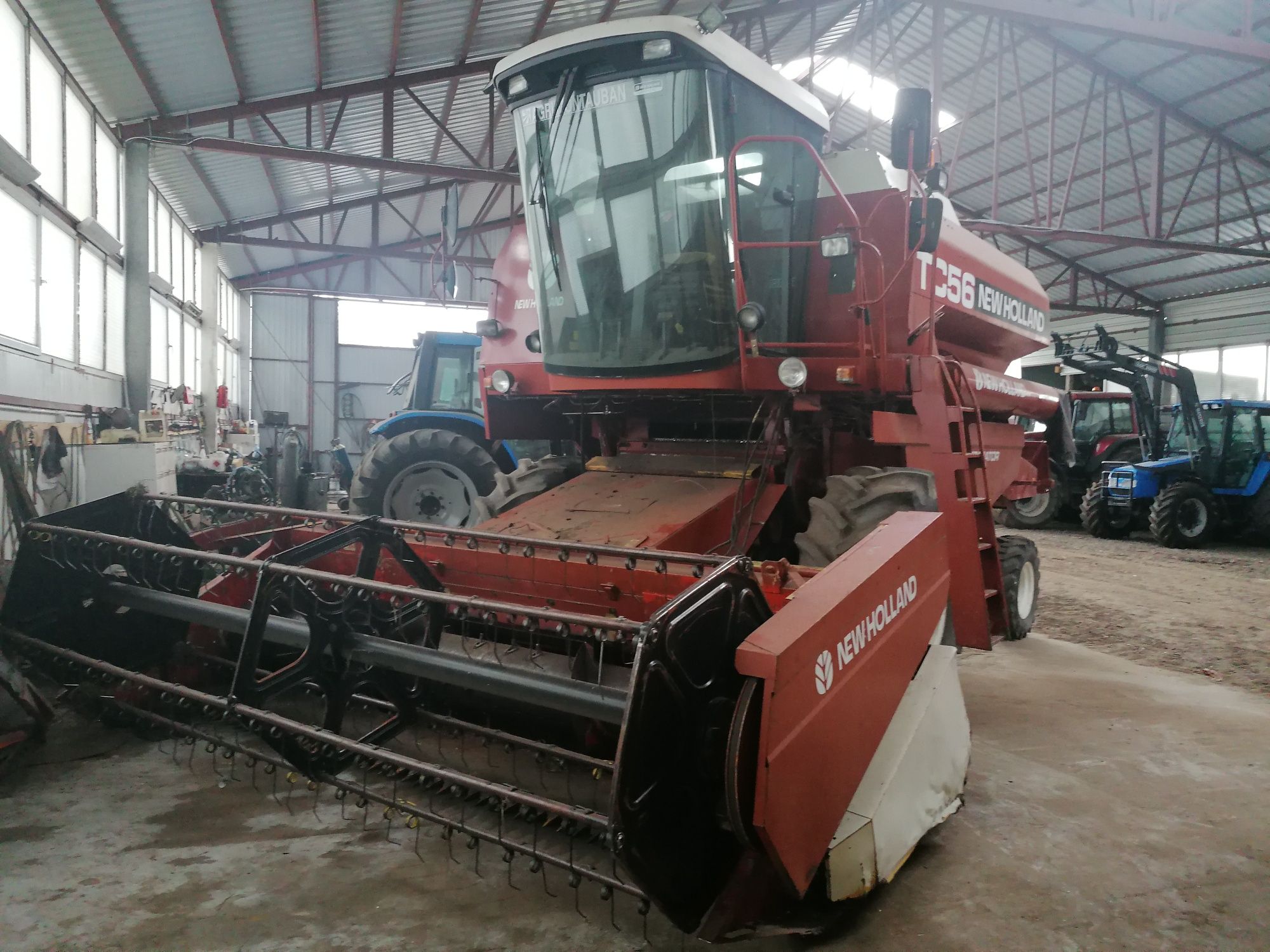 Kombajn zbożowy new holland tc 56  class john derre