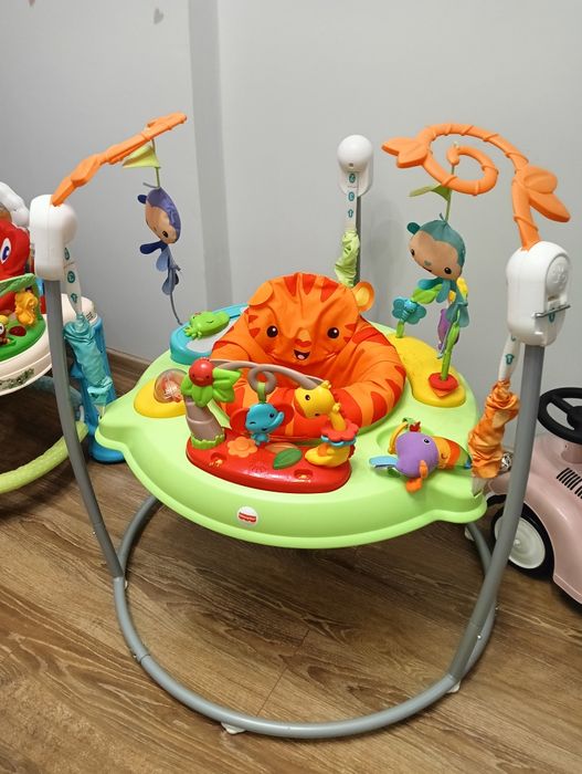 FISHER PRICE skoczek z dźwiękami Wesoła dżungla Jumperoo