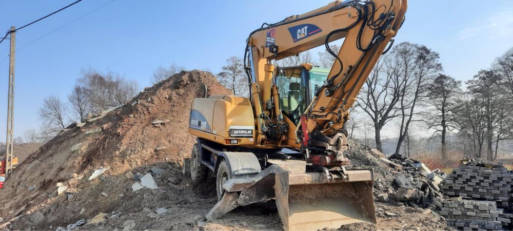 Koparka kołowa obrotowa CAT M315 C rototilt