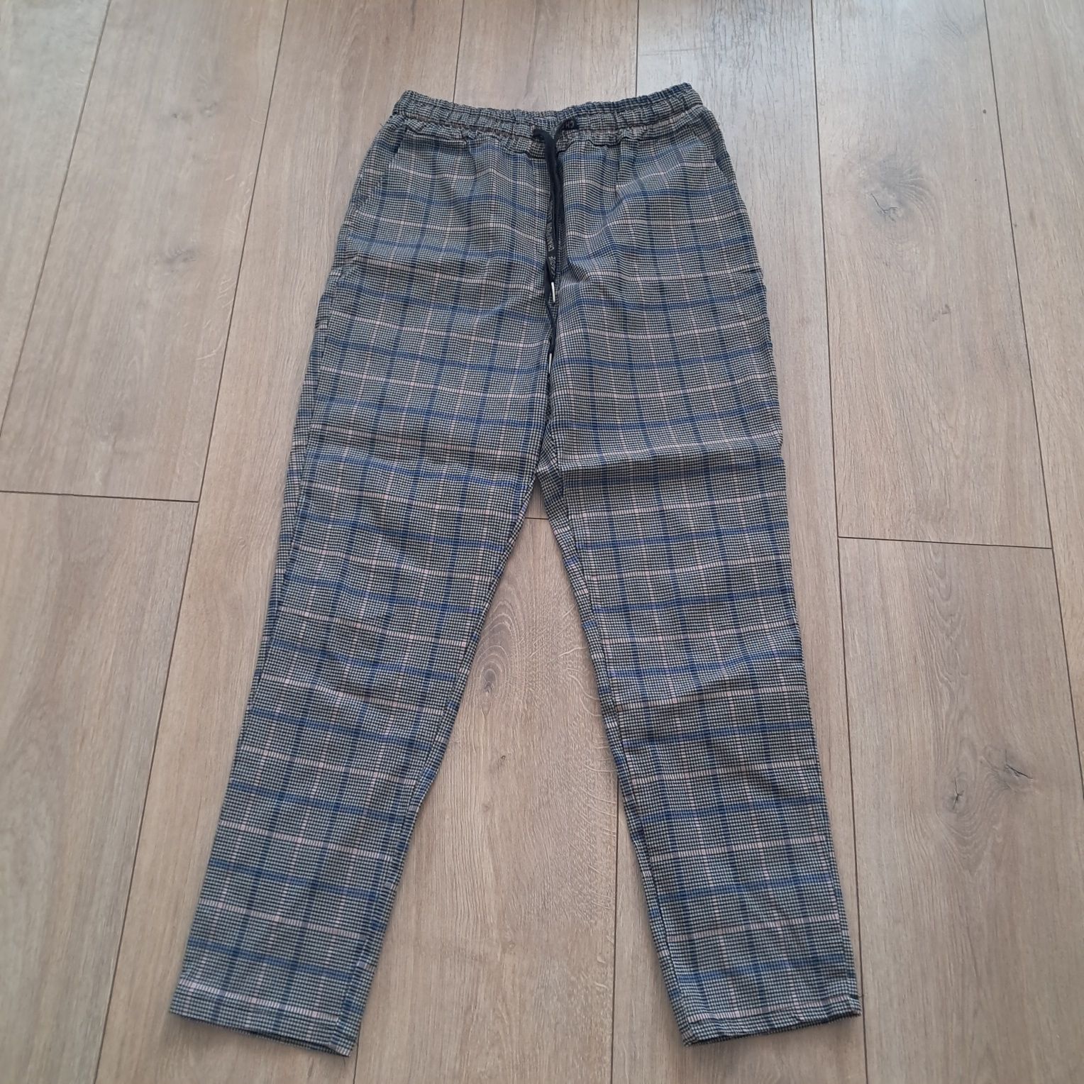 Spodnie w kratkę firmy DS collection rozm.XL
