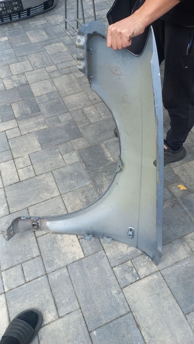 A3 8p 03-08 blotnik przedni prawy blekitny ly7j