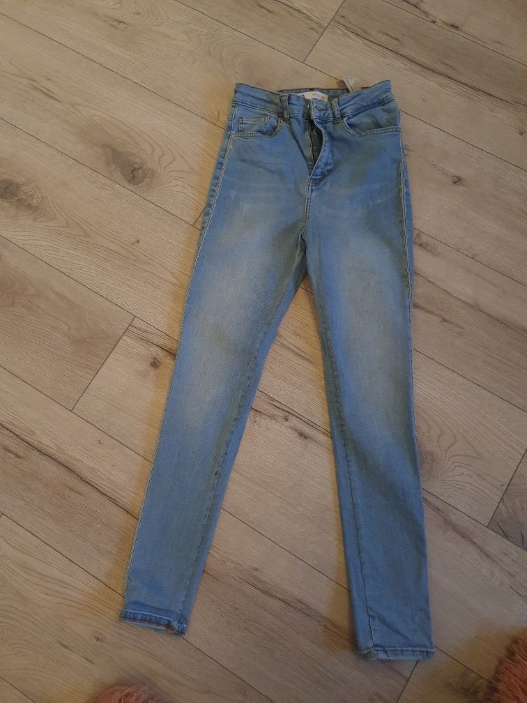 Śliczne spodnie jeansy Zara r. 36 niebieskie