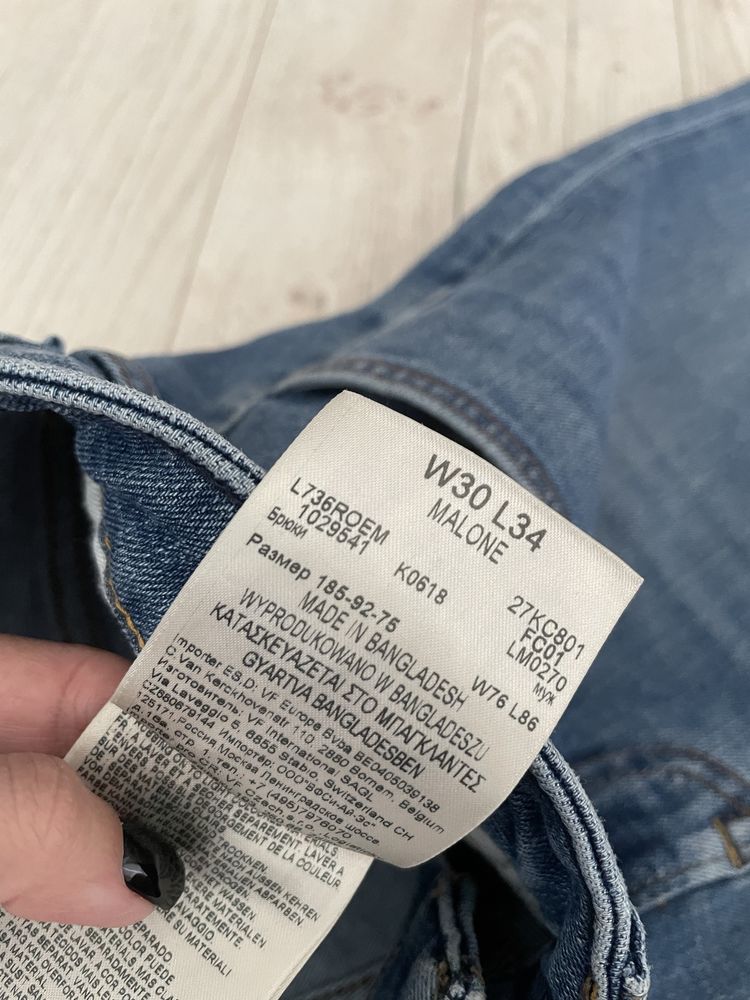 Niebieskie bawełniane meskie spodnie jeansy skinny Lee W30 L34