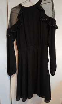 Czarna sukienka z falbanką