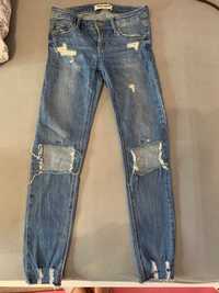 Spodnie jeansy z niskim stanem z dziurami tally wejl XS