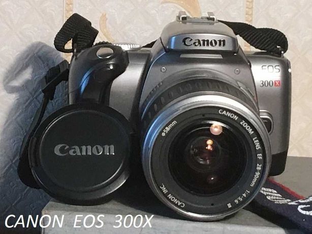 Фотоаппарат пленочный  Canon EOS 300x + фирм. сумка, принадлежности.