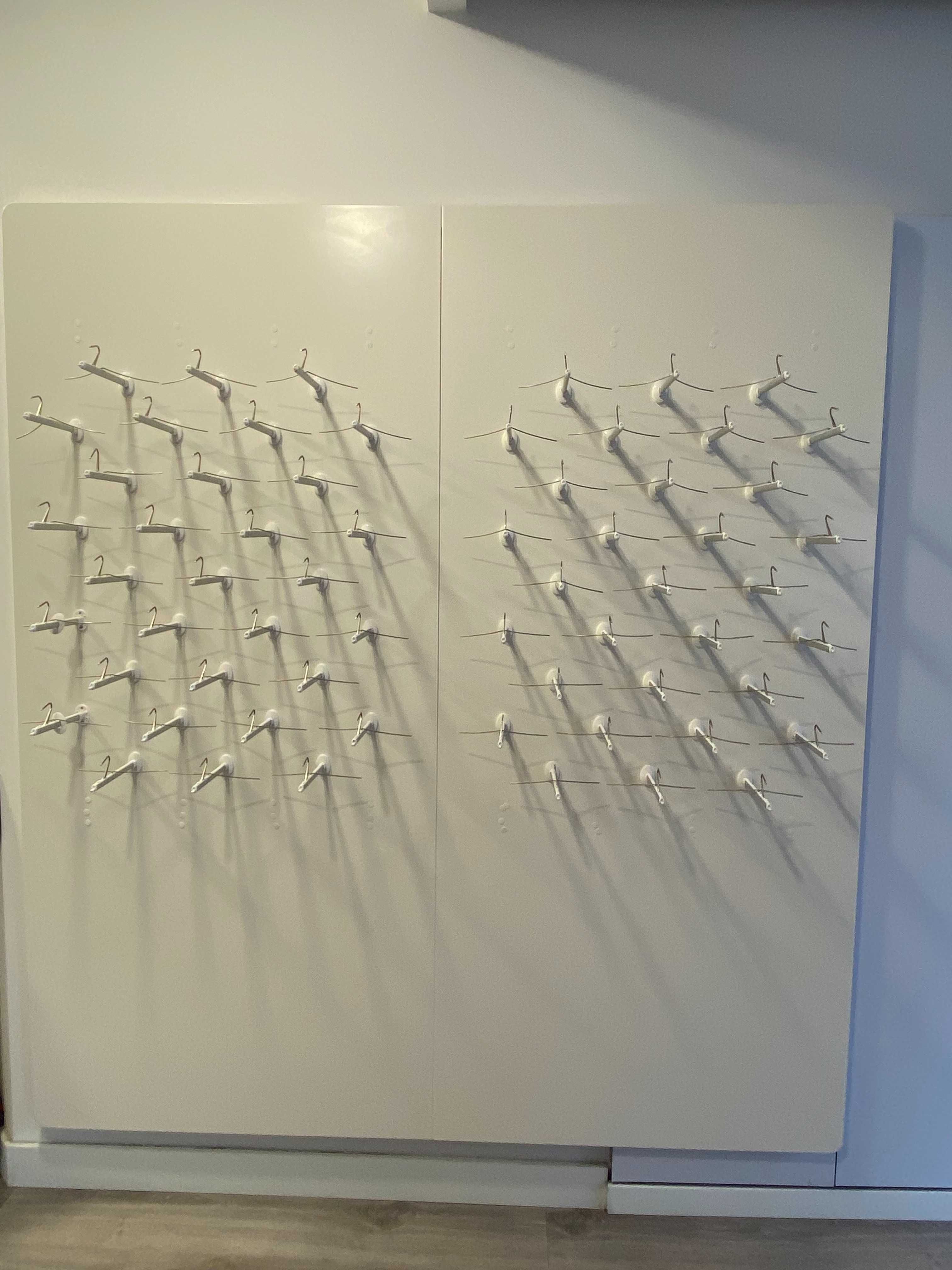 Painéis para exposição de óculos