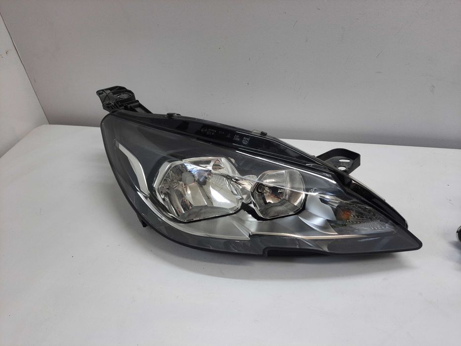 Peugeot 308 T9 13- lampa reflektor lewy prawy przód oryginał europa