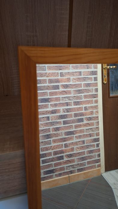 Lustro w drewnianej ramie prawdopodobnie sosnowej 40 × 97 cm