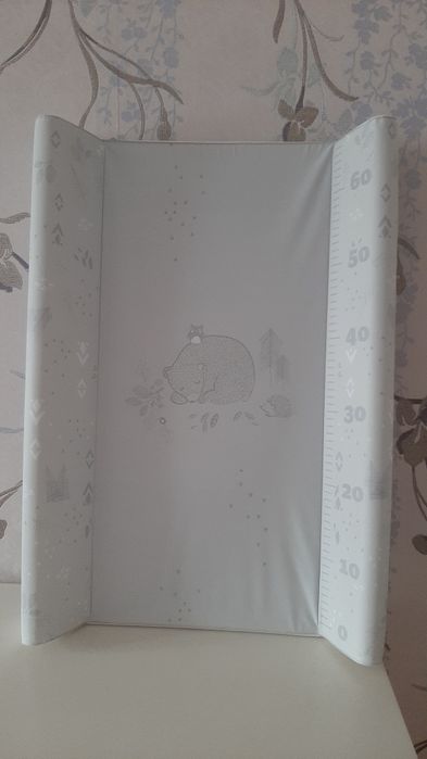 Пеленальна дошка для сповивання