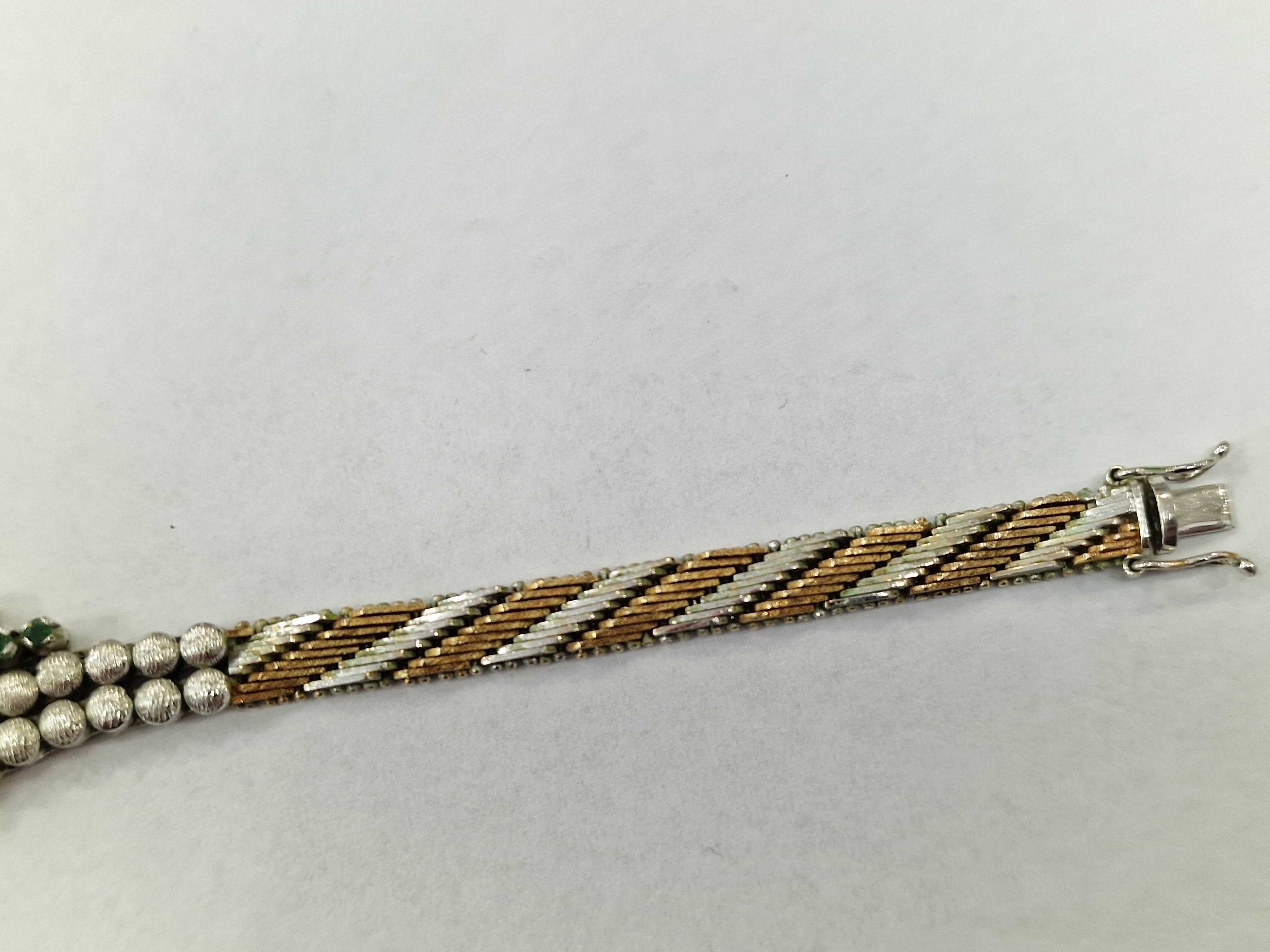 Złota bransoletka damska/ 585/ 26.69 gram/ 18cm/ 9x szmaragd