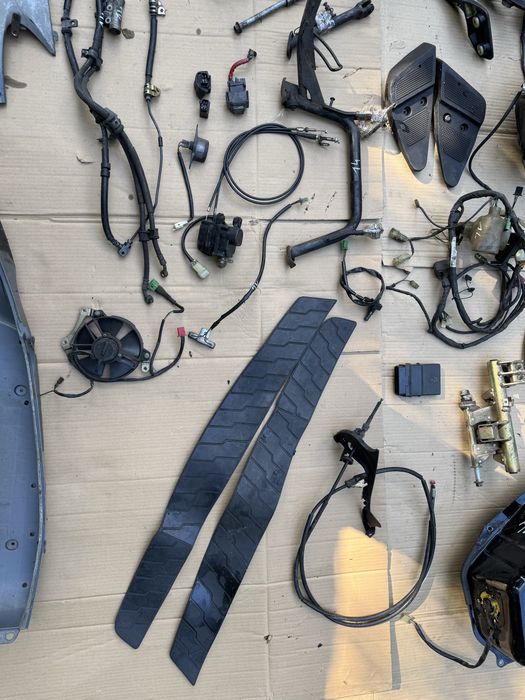 Honda Pantheon 150 owiewka lampa czujnik kiwak instalacja uchwyt wąż