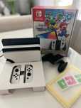 Nintendo Switch OLED + Mario Bros Wonder