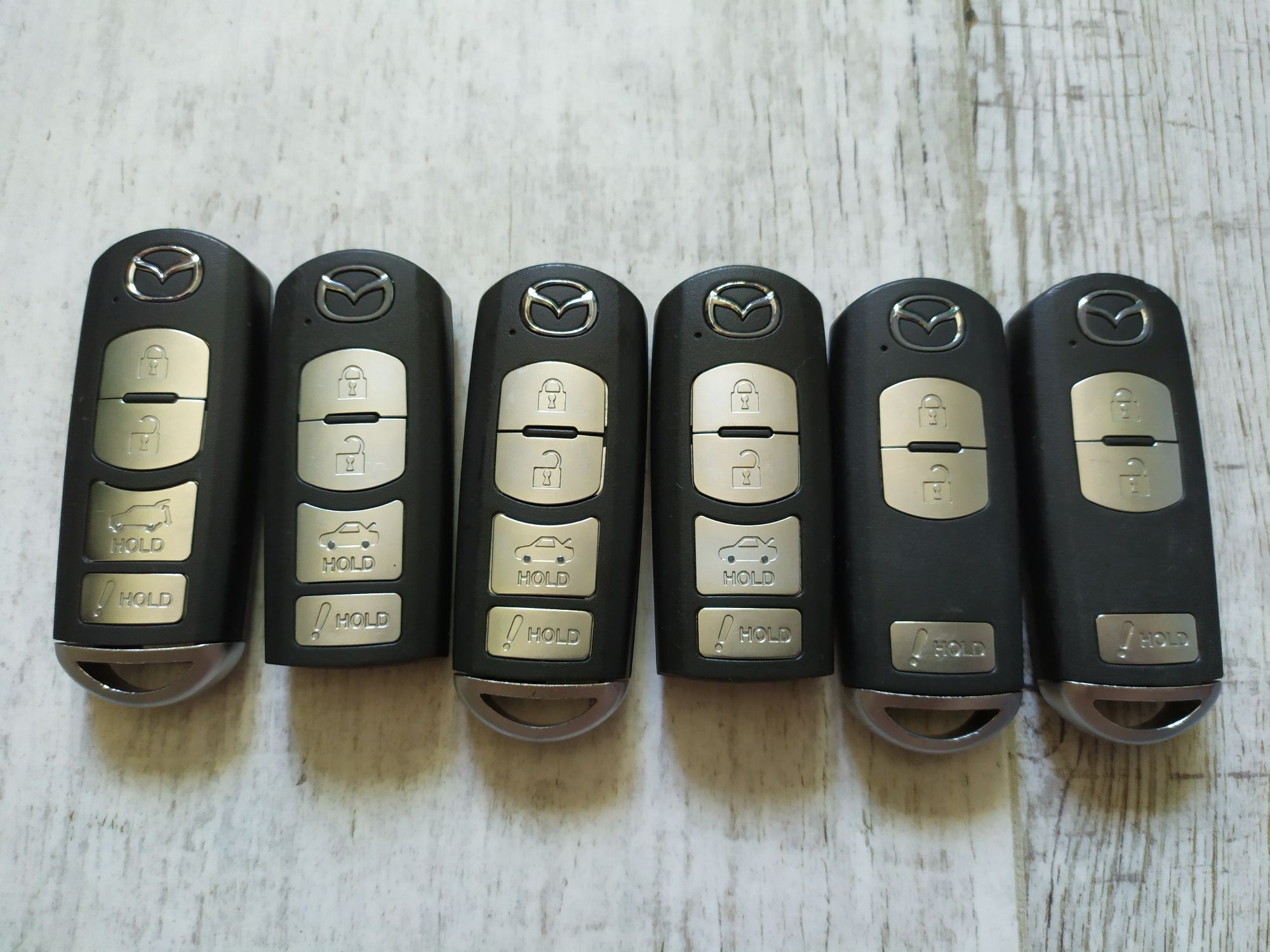 Оригинальные б/у смарт ключи Mazda WAZSKE13D01, D02, D03