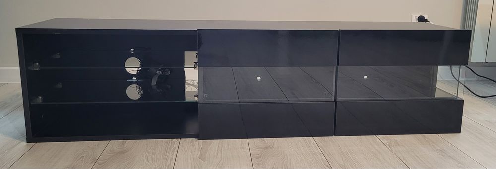 Szafka RTV wisząca 140x35x35, szklane półki + ośw. LED czarna, używana