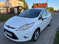 Ford Fiesta 1.4 B AUTOMAT TITANIUM śnieżnobiały Alu Parki Sensor Bluetooth z Niem.
