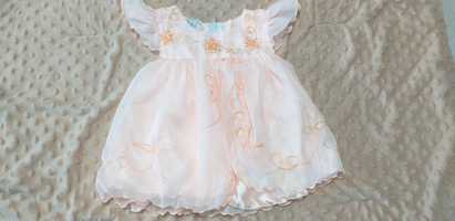 Sukienka niemowlęca w kolorze brzoskwiniowym roz. 2  ok. 70 cm.