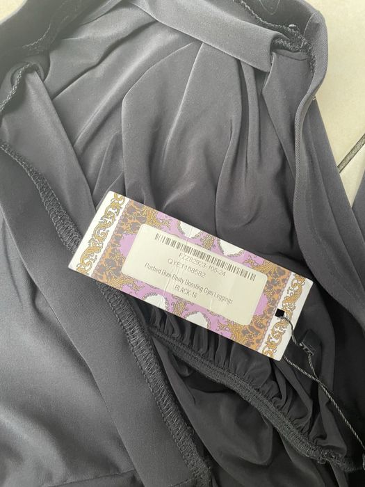 Legginsy roz.44/46 czarne błyszczące marszczone