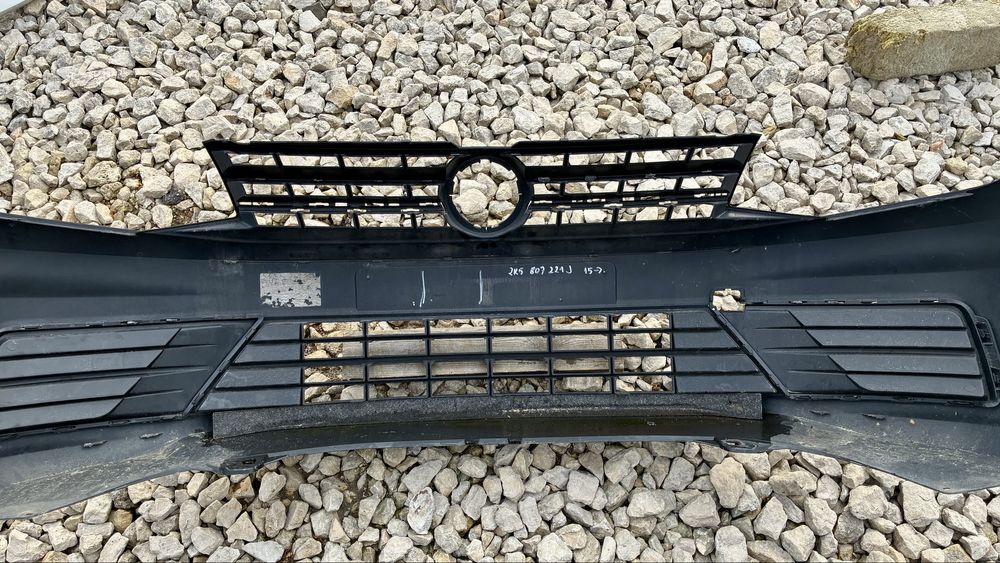 Zderzak przedni bez otworów VW Caddy III 2K5 FL lift 15- oryginal