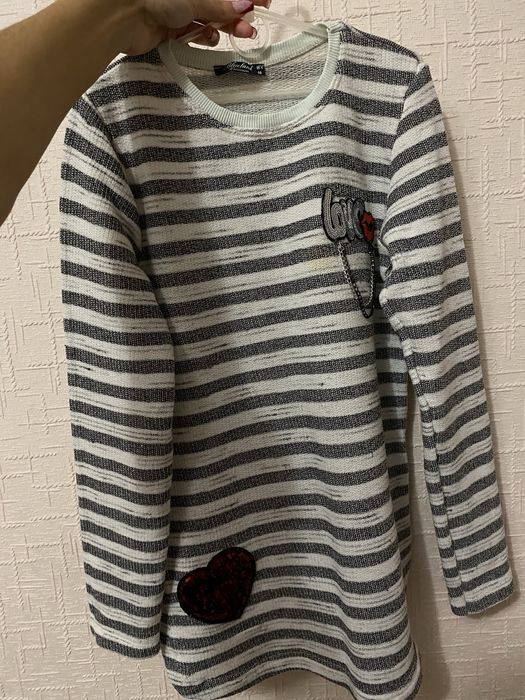 Тепла подовжена кофта-туніка в полоску