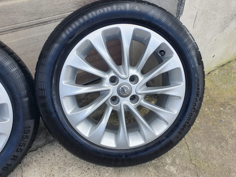 Koła felgi aluminiowe Opel Corsa D E 4x100 ET40 BDB Continental