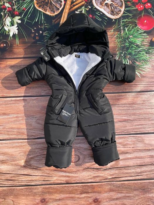 Зимові комбінезони