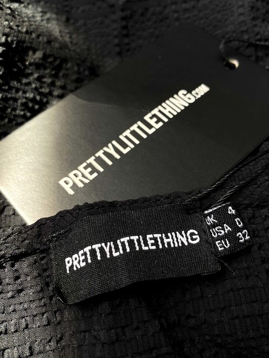 Чорна сукня від PLT