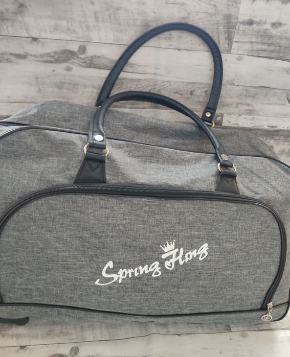 Сумки дорожні на колесах,  для спорту та подорожі